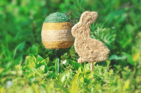 Handmade Easter composition in ecological style in the green grassの写真素材