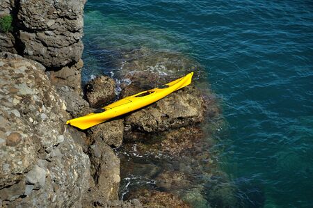kayak on the rocky shore, kayak on shoreの写真素材