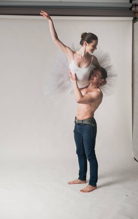 Romantic relations between ballerina and ballet partner. Couple in love.の写真素材