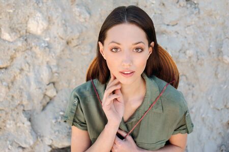 portrait of eastern girl in khaki dress focus on eyes