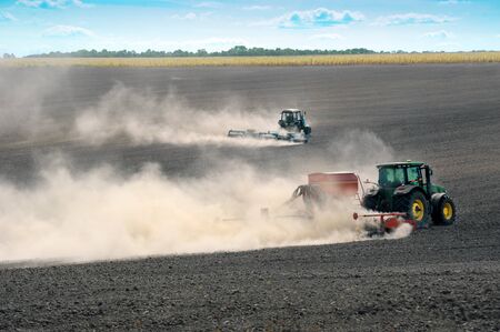 Terebovla region, Ternopil ,Ukraine - 14 September, 2019 : Sowing and cultivation on field. a...