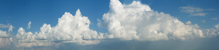Clouds against the sky. Clouds on the background of the blue sky. beautiful volume and lightの写真素材