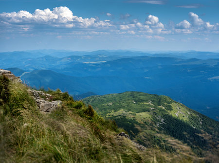 landscape of mountains and aerial perspective from Mount Pip Ivan, and alpine grasses, Carpathians, Ukraineの写真素材