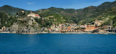 Panoramic view of the seaside village of Monterosso al Mare, Cinque Terre, colorful buildings,...