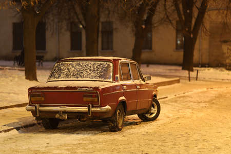 LVIV, UKRAINE - January 17, 2021: Old Lada car at night and in winterのeditorial素材