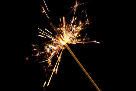 Sparkler close-up on a black backgroundの写真素材