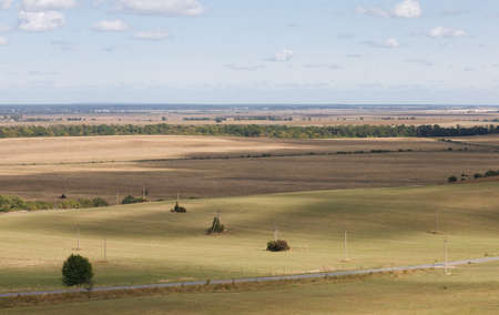 Simple autumn landscape with cloudsの写真素材