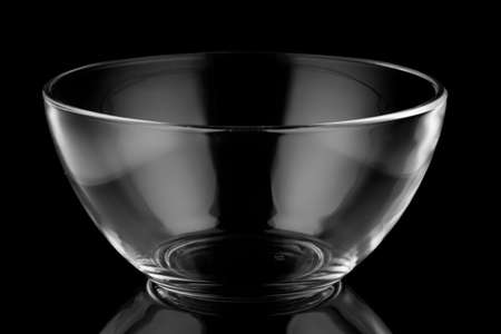 Glass jar and bowl empty black backgroundの写真素材