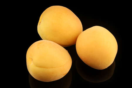 fresh apricot on a black backgroundの写真素材