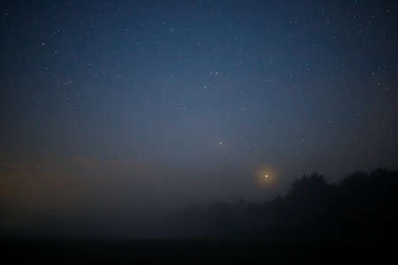 Starry night beautiful summer landscapeの写真素材