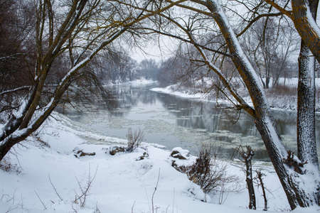 Beautiful Dniester river and snow winter landscapeの写真素材