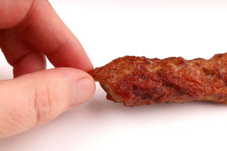 Lyulya kebab Delicious meat on a stick in handの写真素材