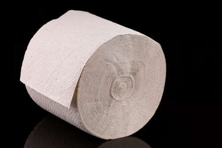 Toilet paper on dark backgroundの写真素材