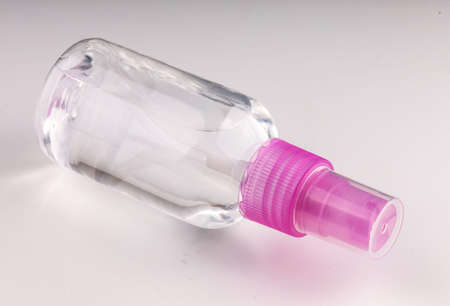 Antiseptic or hand spray closeup dark backgroundの写真素材