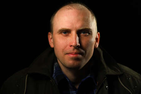 Portrait of a bald man of middle ageの写真素材