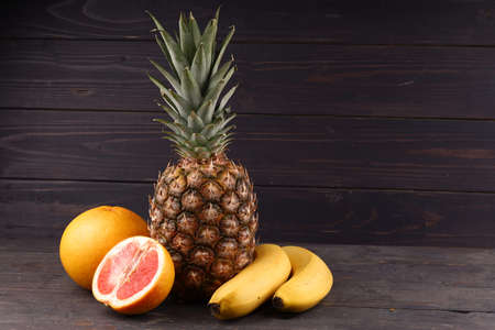 Pineapple and exotic fruits with juiceの写真素材