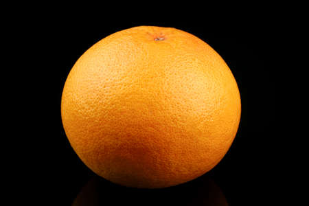 Grapefruit fruit on black backgroundの写真素材