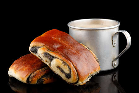 Bun with poppy seeds and muffins with milkの写真素材