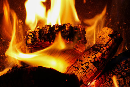 Burning piece of wood closeup