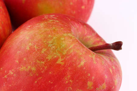 Red apple Fuji grade on a white backgroundの写真素材