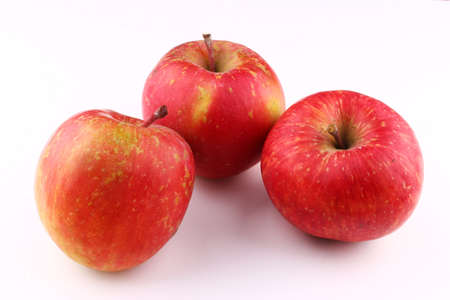 Red apple Fuji grade on a white backgroundの写真素材