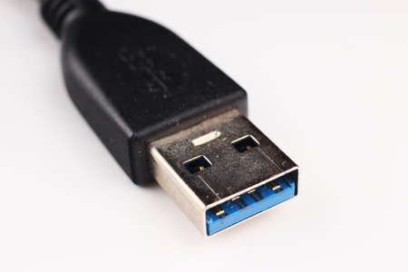 usb cable on a white background closeupの写真素材
