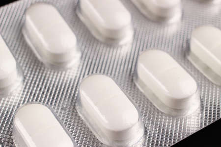 White pills in blister close upの写真素材