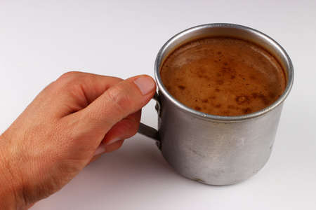 Cup of cappuccino on a white backgroundの写真素材