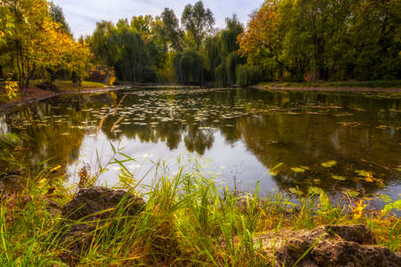 Beautiful autumn lake in the dayの写真素材