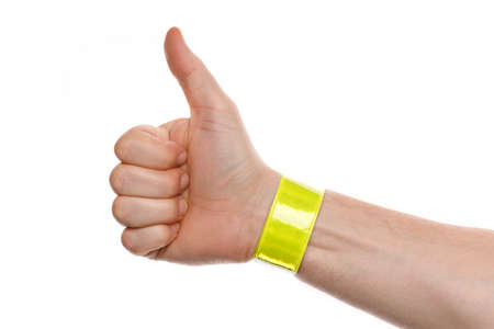 Reflective tape on the wrist on a white backgroundの写真素材