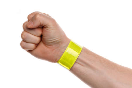 Reflective tape on the wrist on a white backgroundの写真素材
