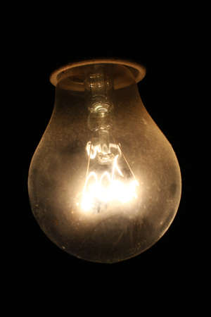 Incandescent lamp in the dark closeupの写真素材