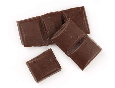 Brown chocolate cubes on a white background isolateの写真素材