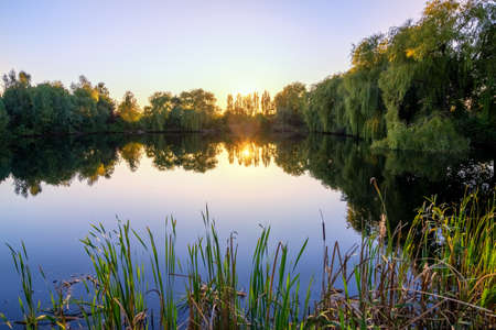 Landscape lake during beautiful sunriseの写真素材