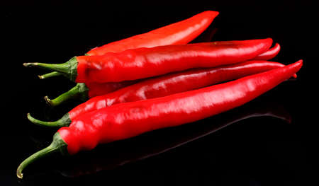 Red hot chili pepper on a black backgroundの写真素材