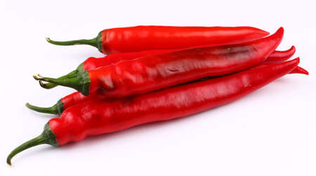 Red hot chili peppers on a white background isolateの写真素材