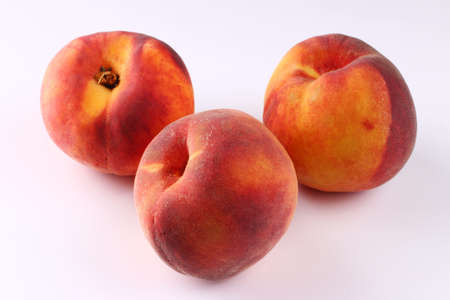 Peach on a white backgroundの写真素材