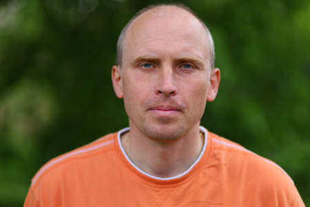 Portrait of a young middle-aged European white man in summer