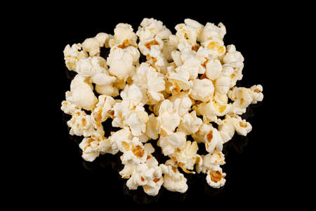 Popcorn corn on a black background close-upの写真素材