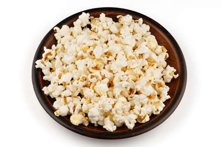 Delicious popcorn corn snack in a plate close-upの写真素材