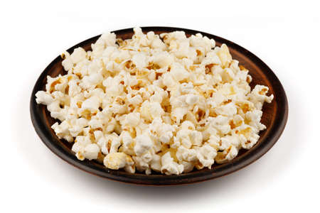 Delicious popcorn corn snack in a plate close-upの写真素材