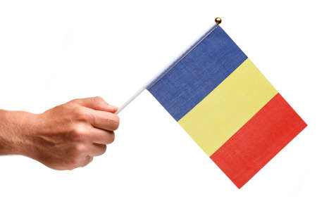 Romania flag small in hand isolate.の写真素材
