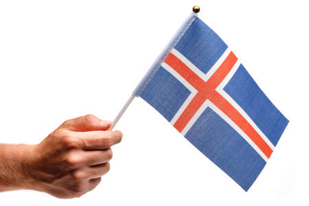 Iceland flag small in hand isolate.の写真素材