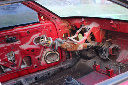 Disassembled old car. Scrap from the car.の写真素材