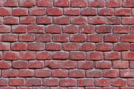 Red old brick wall. Interesting texture or background.の写真素材