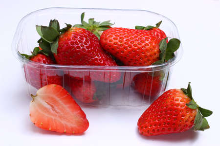 Strawberry berry in a plastic containerの写真素材