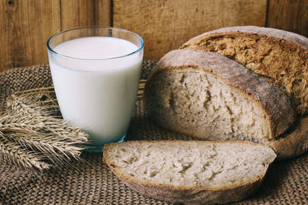 Bread and milk. Simple rustic food.の写真素材