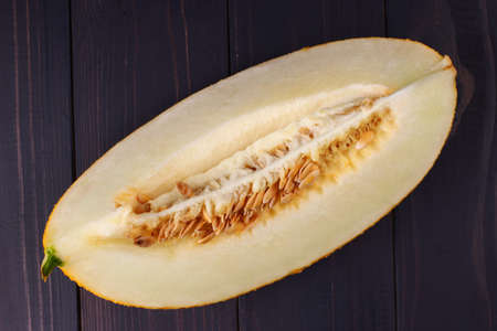 Piece of melon on a dark backgroundの写真素材