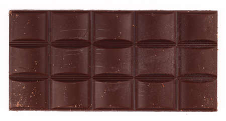 A bar of brown chocolate on a white background