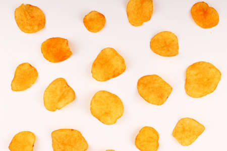 Potato chips on a white backgroundの写真素材
